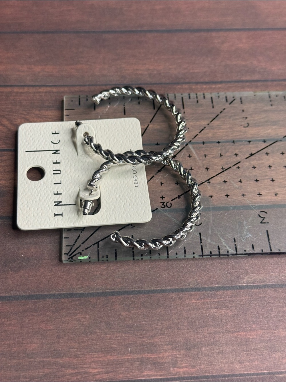 Twisted Hoop Earrings in silver